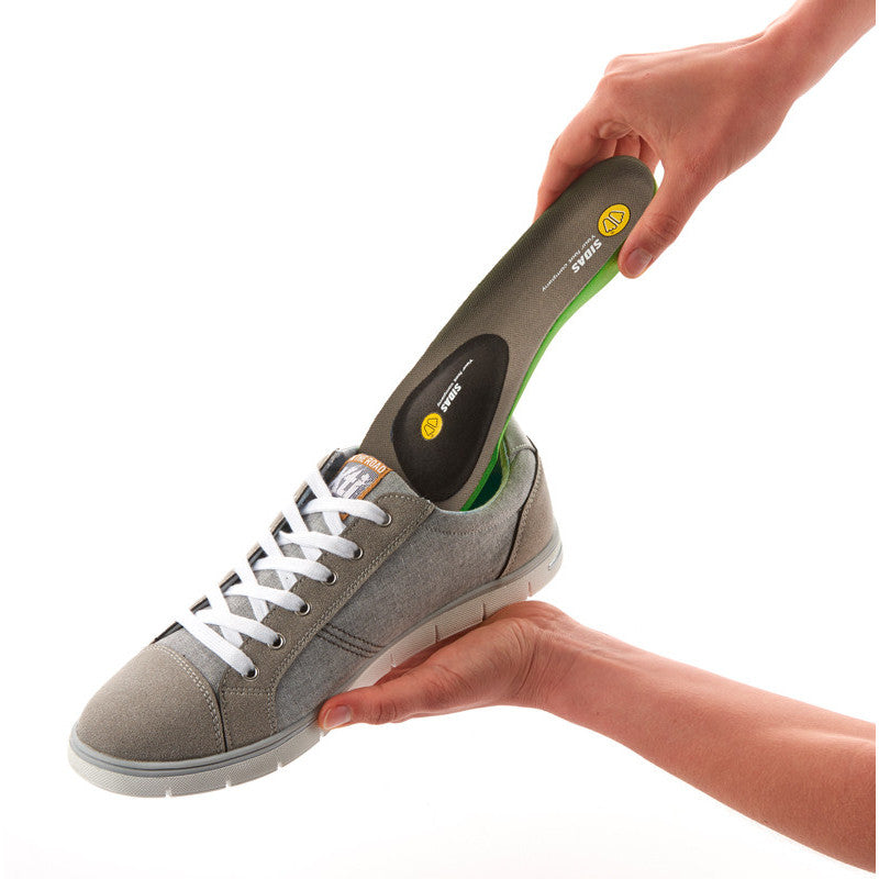 Sidas Foam Met Pad fitted Insole being inserted into shoe