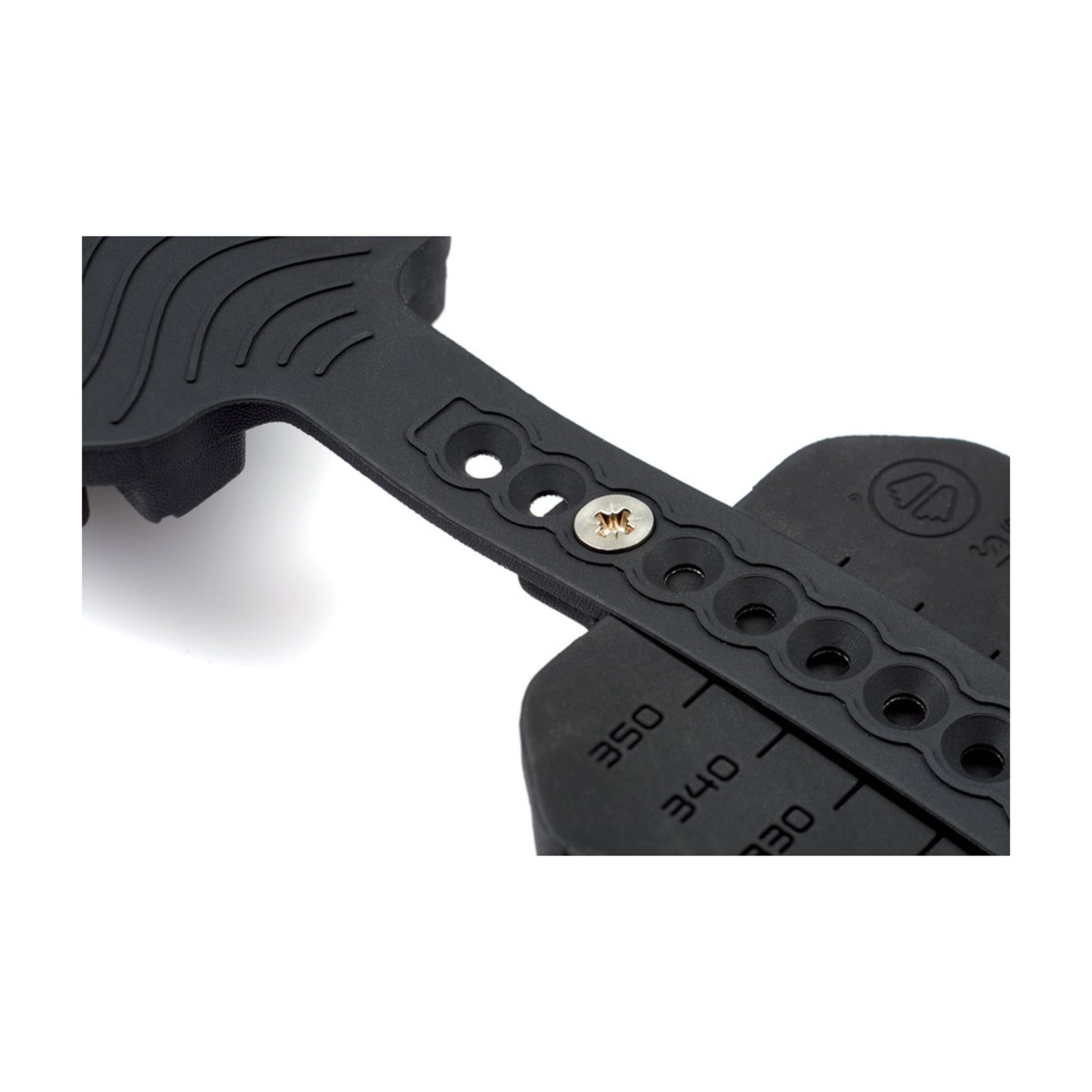 Black metal tool with measurement markings on a white background