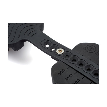 Black metal tool with measurement markings on a white background