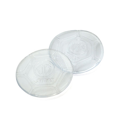 Two clear plastic pads with a textured surface on a white background