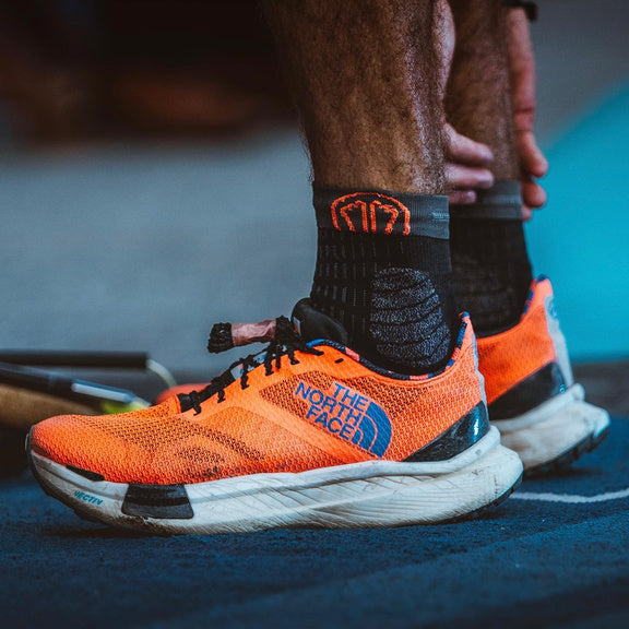t-free trail running socks black grey being worn