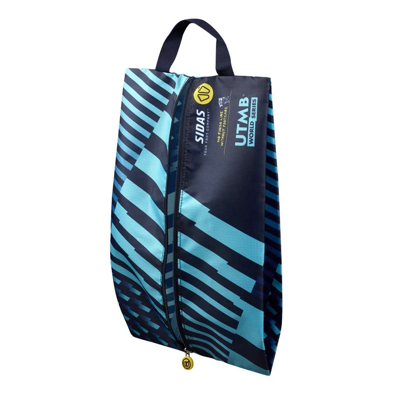 A Sidas UTMB World Series zippered shoe bag with a geometric pattern of black and light blue diagonal stripes, featuring a top carry handle and product branding.